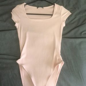 Ribbed pink short sleeved bodysuit